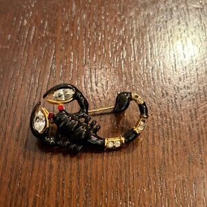 Elegant Black and Gold Scorpion Brooch